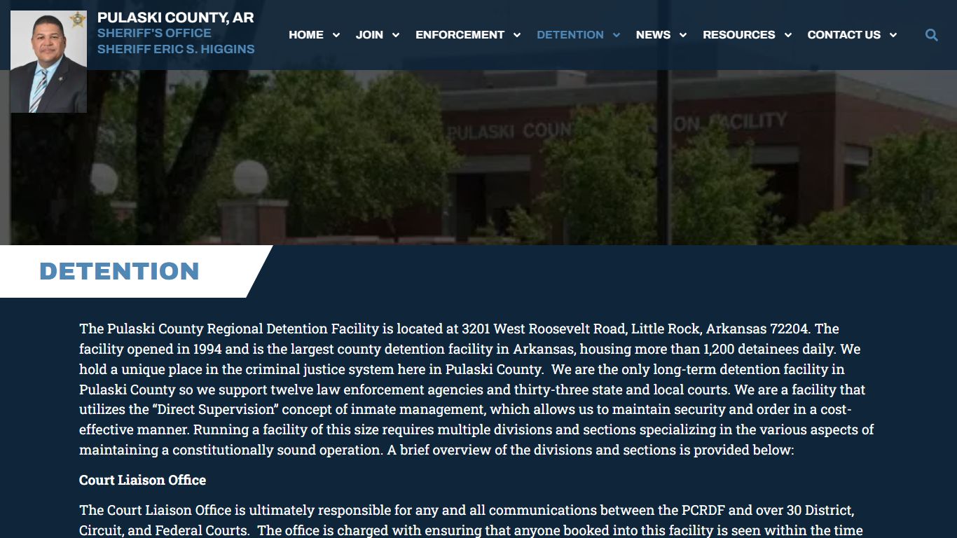 Pulaski County Regional Detention Facility exterior view showing main entrance and security fencing